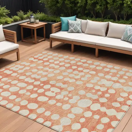 Coral And Ivory Abstract Washable Indoor Outdoor Area Rug Photo 1