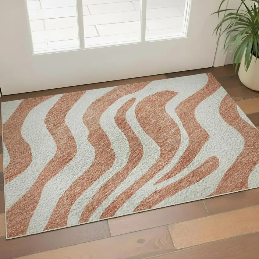 Coral And Ivory Animal Print Washable Area Rug With UV Protection Photo 2