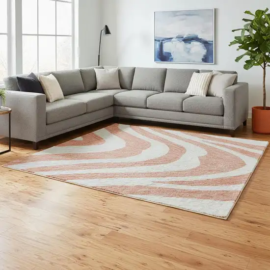 Coral And Ivory Animal Print Washable Area Rug With UV Protection Photo 1