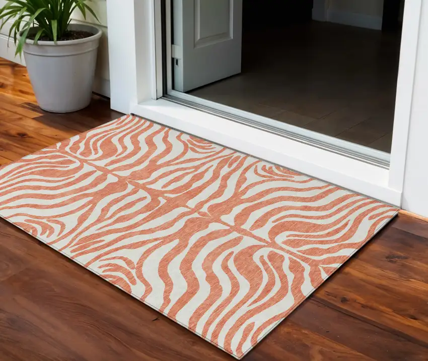 Coral And Ivory Animal Print Washable Indoor Outdoor Area Rug Photo 1