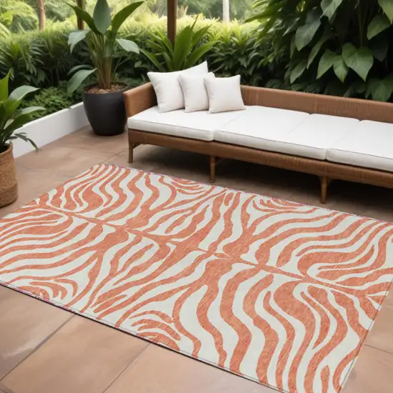 Coral And Ivory Animal Print Washable Indoor Outdoor Area Rug Photo 1