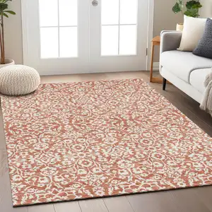 Photo of Coral And Ivory Damask Washable Indoor Outdoor Area Rug