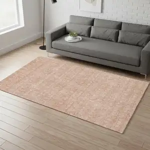 Photo of Coral And Ivory Floral Washable Area Rug With UV Protection