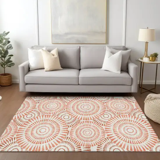 Coral And Ivory Geometric Washable Indoor Outdoor Area Rug Photo 9