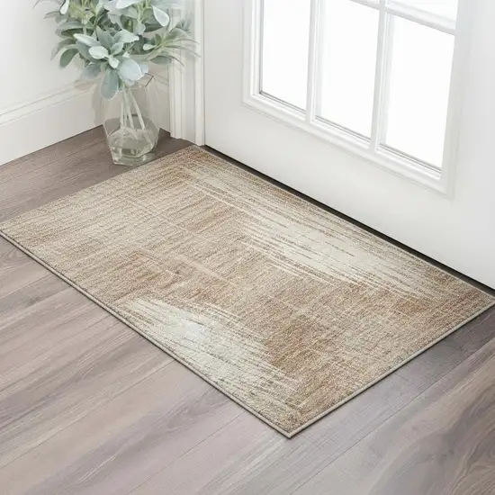 Coral And Ivory Ikat Washable Area Rug With UV Protection Photo 2