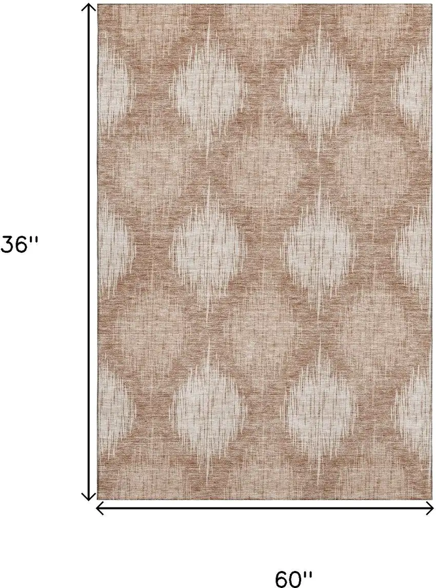 Coral And Ivory Ikat Washable Area Rug With UV Protection Photo 3