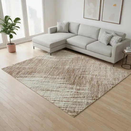 Coral And Ivory Ikat Washable Area Rug With UV Protection Photo 2