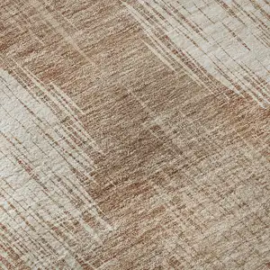 Photo of Coral And Ivory Ikat Washable Area Rug With UV Protection