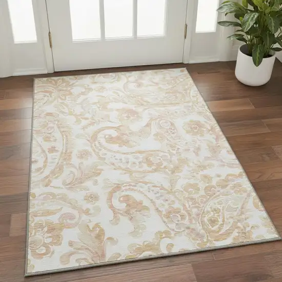 Coral And Ivory Paisley Washable Area Rug With UV Protection Photo 2