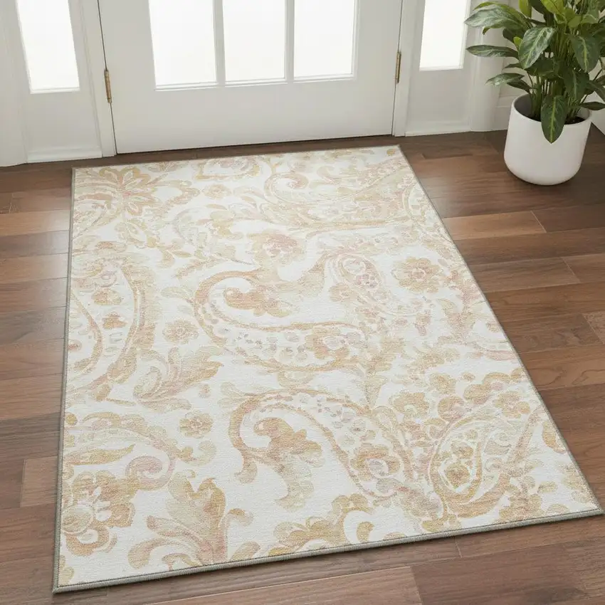 Coral And Ivory Paisley Washable Area Rug With UV Protection Photo 2
