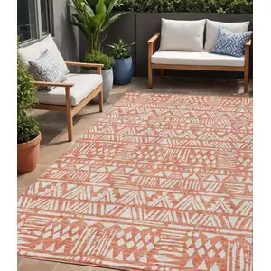 Photo of Coral And Ivory Southwestern Washable Indoor Outdoor Area Rug
