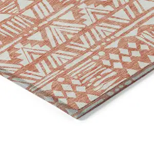 Photo of Coral And Ivory Southwestern Washable Indoor Outdoor Area Rug