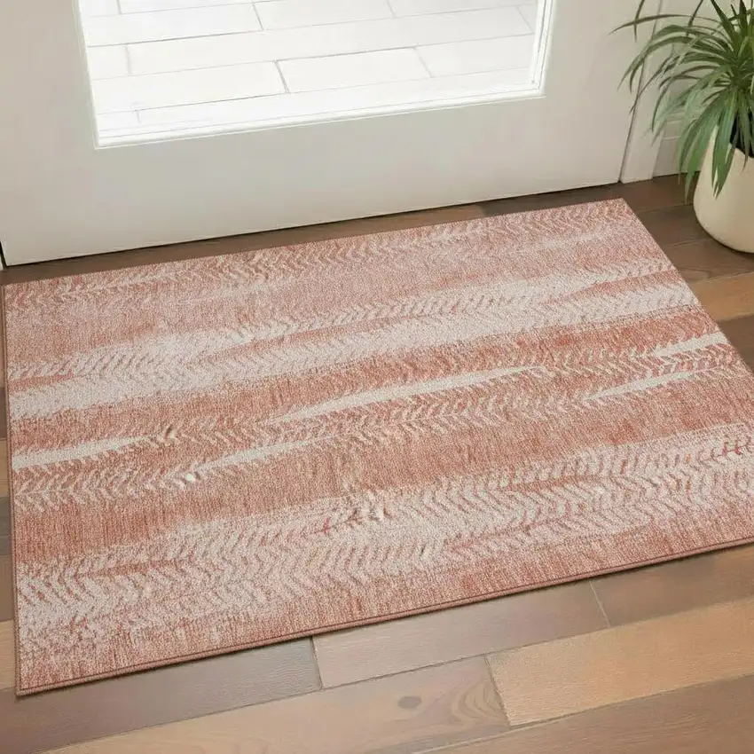 Coral And Ivory Striped Washable Area Rug With UV Protection Photo 1