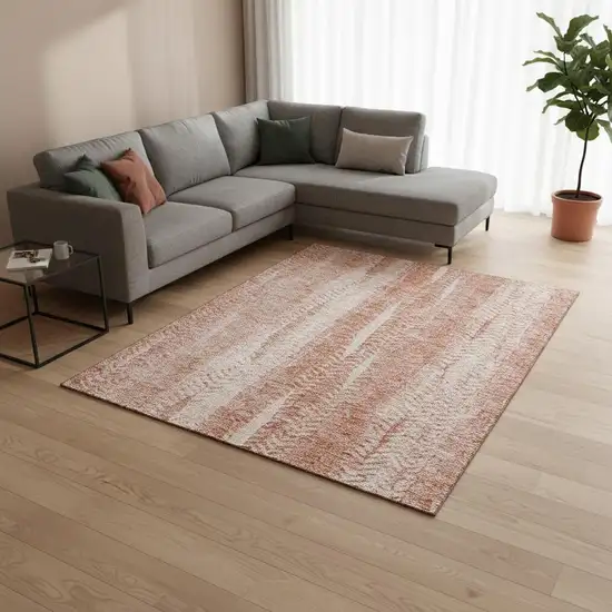 Coral And Ivory Striped Washable Area Rug With UV Protection Photo 1