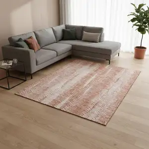 Photo of Coral And Ivory Striped Washable Area Rug With UV Protection