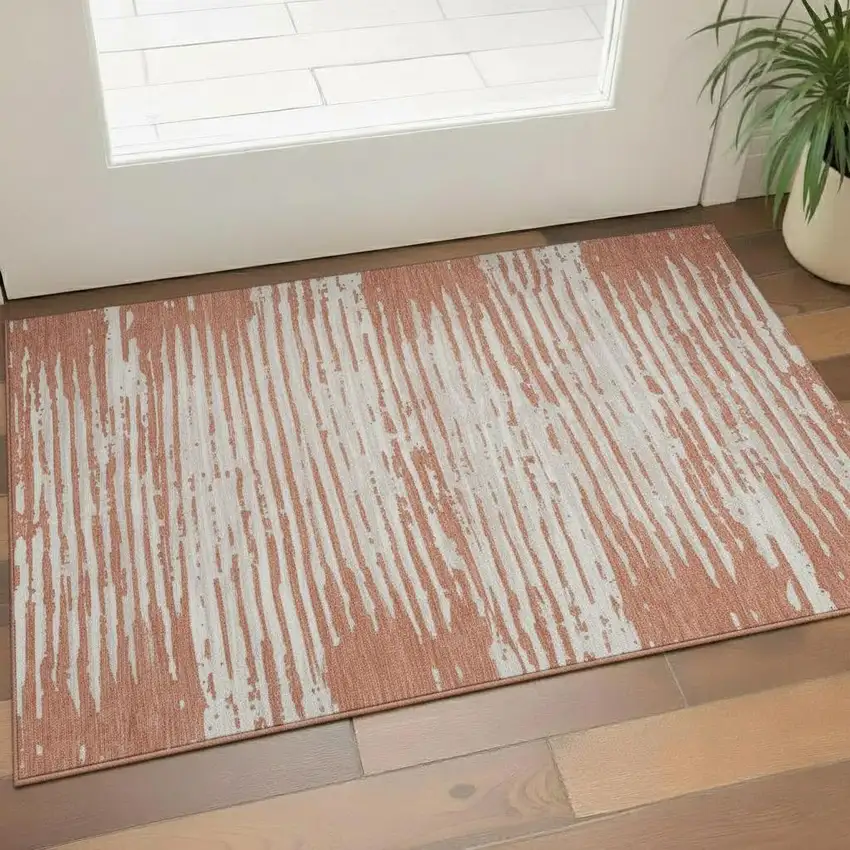 Coral And Ivory Striped Washable Area Rug With UV Protection Photo 1