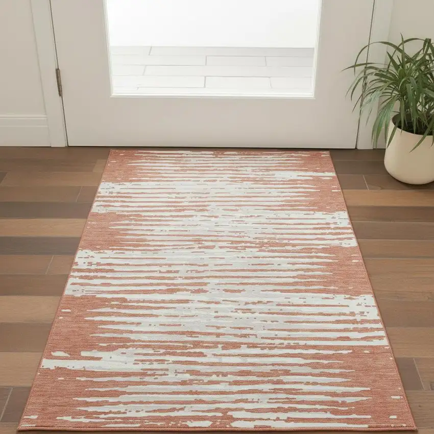 Coral And Ivory Striped Washable Area Rug With UV Protection Photo 2