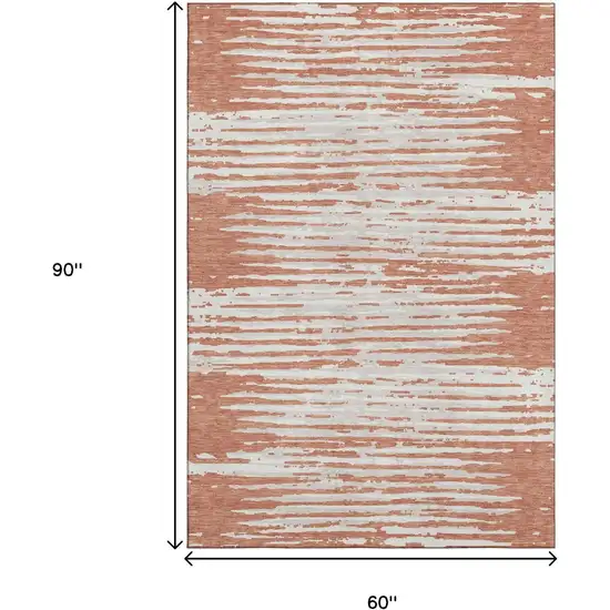 Coral And Ivory Striped Washable Area Rug With UV Protection Photo 9
