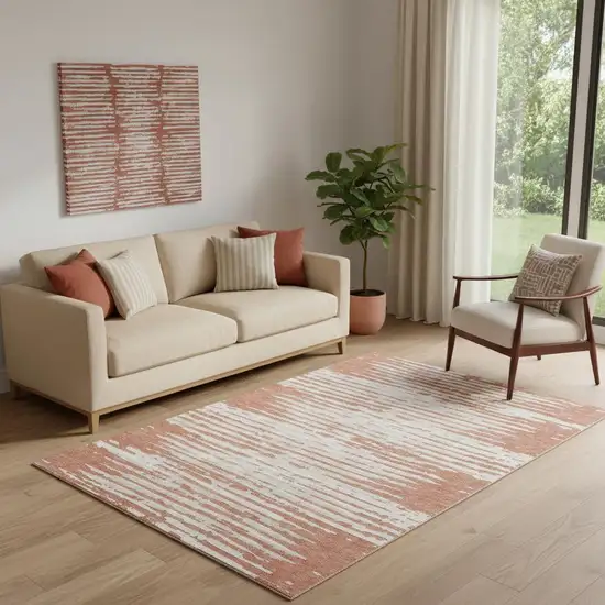 Coral And Ivory Striped Washable Area Rug With UV Protection Photo 1