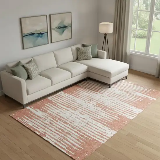 Coral And Ivory Striped Washable Area Rug With UV Protection Photo 1