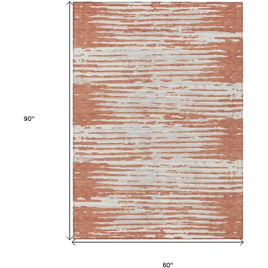 Coral And Ivory Striped Washable Indoor Outdoor Area Rug Photo 3