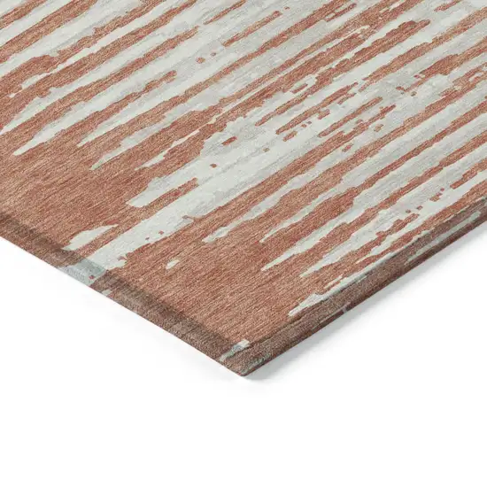 Coral And Ivory Striped Washable Indoor Outdoor Area Rug Photo 5