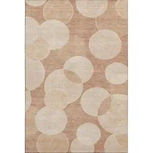Photo of Coral And Peach Geometric Washable Area Rug With UV Protection