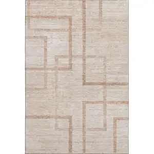 Photo of Coral And Rust Geometric Washable Area Rug With UV Protection