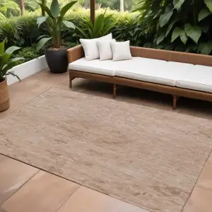 Photo of Coral And Tan Floral Washable Indoor Outdoor Area Rug