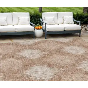 Photo of Coral And Terra Cotta Ikat Washable Indoor Outdoor Area Rug