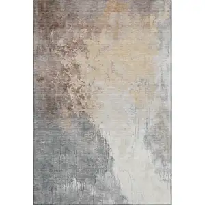Photo of Coral Beige And Ivory Abstract Washable Area Rug With UV Protection