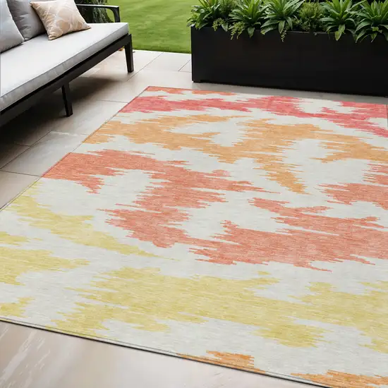 Coral Beige And Orange Abstract Washable Indoor Outdoor Area Rug Photo 1