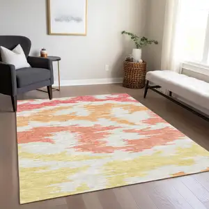 Photo of Coral Beige And Orange Abstract Washable Indoor Outdoor Area Rug