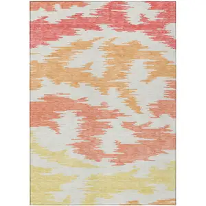 Photo of Coral Beige And Orange Abstract Washable Indoor Outdoor Area Rug