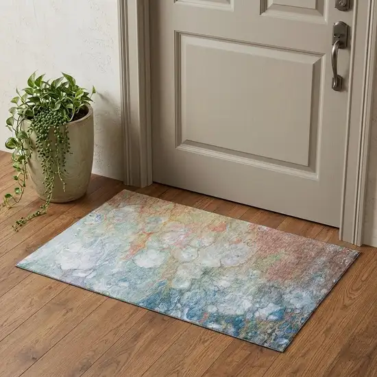 Coral Blue And Ivory Abstract Washable Area Rug With UV Protection Photo 1