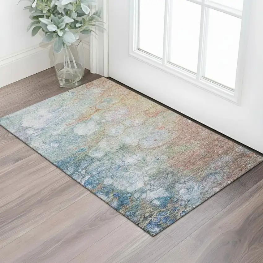 Coral Blue And Ivory Abstract Washable Area Rug With UV Protection Photo 1