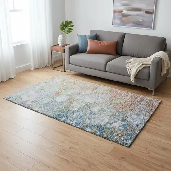 Coral Blue And Ivory Abstract Washable Area Rug With UV Protection Photo 1