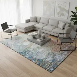 Photo of Coral Blue And Ivory Abstract Washable Area Rug With UV Protection
