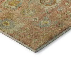 Photo of Coral Gold And Blue Floral Washable Area Rug With UV Protection