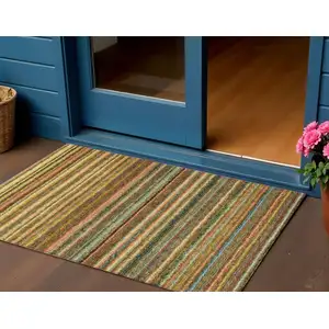 Photo of Coral Gold And Green Striped Washable Indoor Outdoor Area Rug