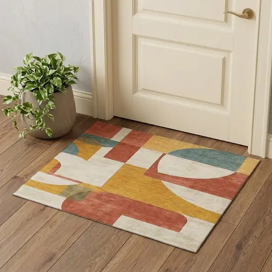 Coral Gold And Ivory Abstract Geometric Washable Area Rug With UV Protection Photo 1