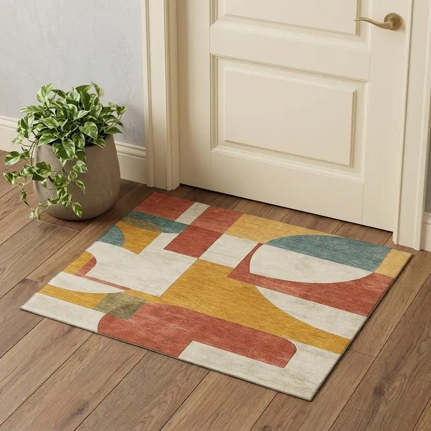 Coral Gold And Ivory Abstract Geometric Washable Area Rug With UV Protection Photo 1