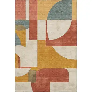 Photo of Coral Gold And Ivory Abstract Geometric Washable Area Rug With UV Protection