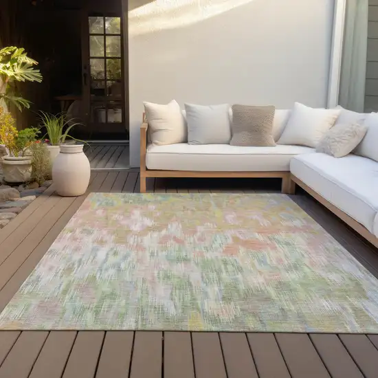 Coral Gold And Ivory Abstract Washable Indoor Outdoor Area Rug Photo 9
