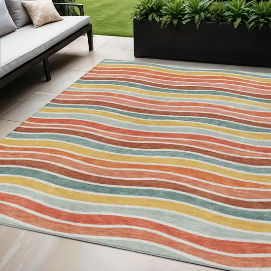 Coral Gold And Peach Striped Washable Indoor Outdoor Area Rug Photo 1
