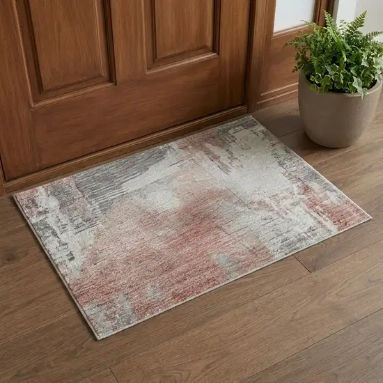 Coral Gray And Ivory Abstract Washable Area Rug With UV Protection Photo 1