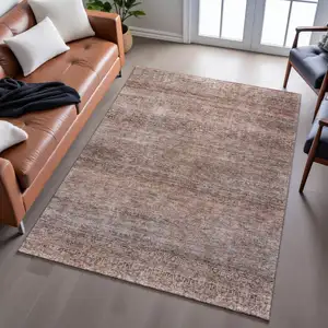 Photo of Coral Gray And Silver Striped Washable Area Rug With UV Protection