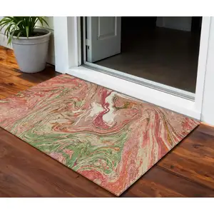 Photo of Coral Green And Ivory Abstract Washable Indoor Outdoor Area Rug