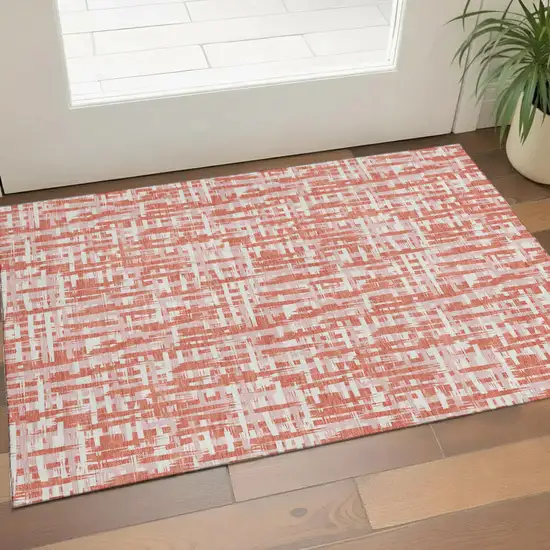 Coral Ivory And Blush Abstract Geometric Washable Area Rug With UV Protection Photo 1