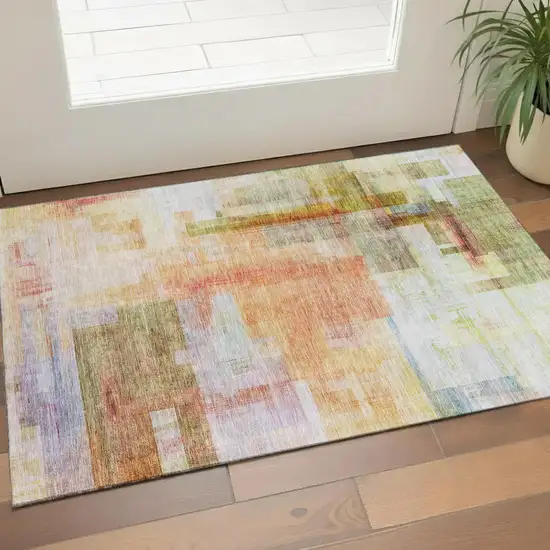 Coral Ivory And Gold Abstract Geometric Washable Area Rug With UV Protection Photo 1